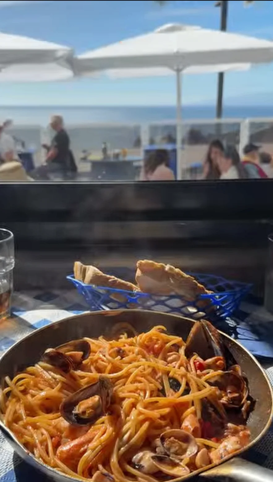 Seafood pasta served by the terrace with ocean view